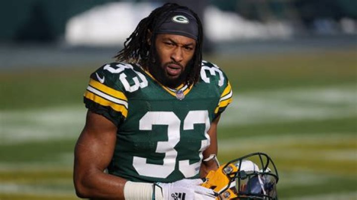 Aaron Jones with the Green Bay Packers as seen while celebrating a victory over the Washington Football Team with his signature sombrero on October 21, 2021