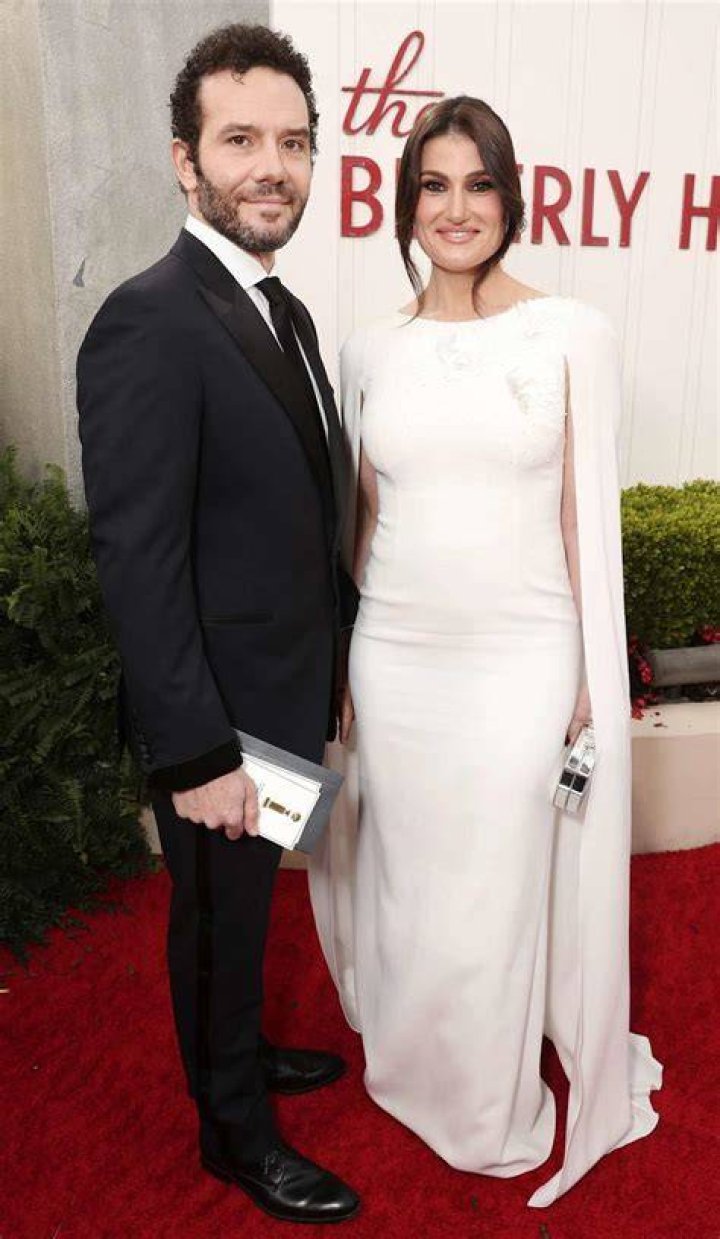 Aaron Lohr and Idina Menzel snapped during an event