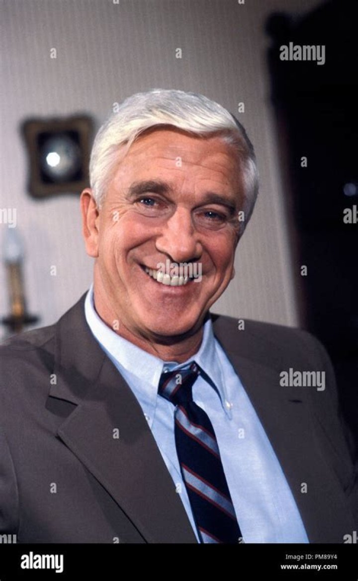 Actor Leslie Nielsen 1982 in a first class seat on United Airlines