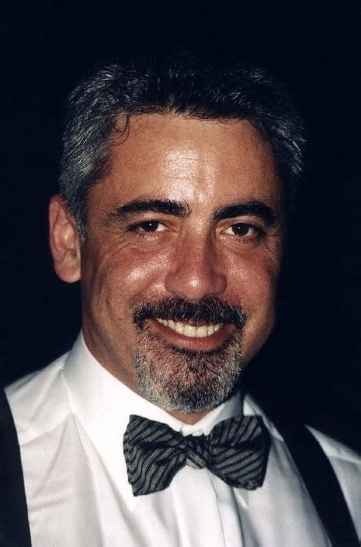 Adam Arkin as seen while smiling