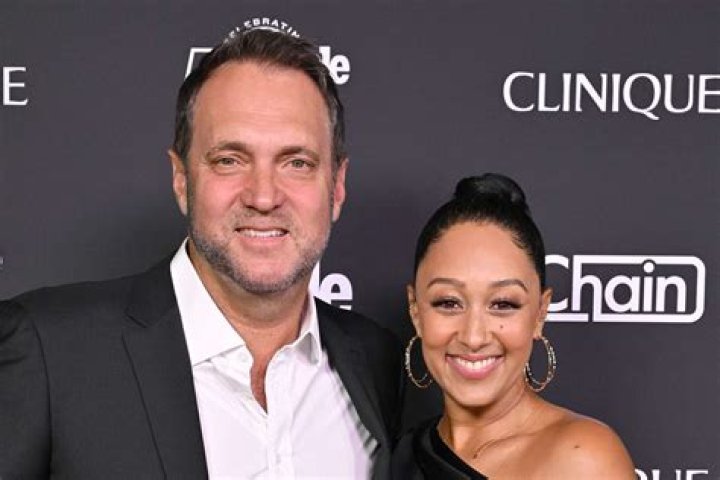 Adam Housley and Tamera Mowry, as seen in August 2022