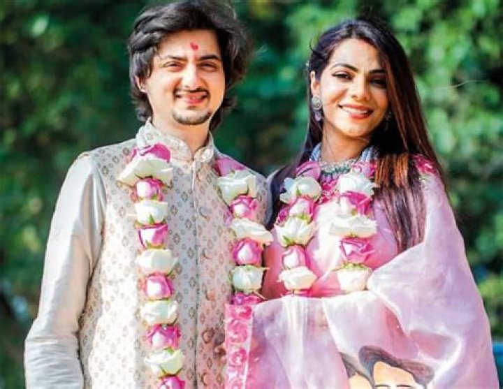 Aditya Kapadia and Tanvi Thakkar smiling for a picture in Lakshwadeep, India