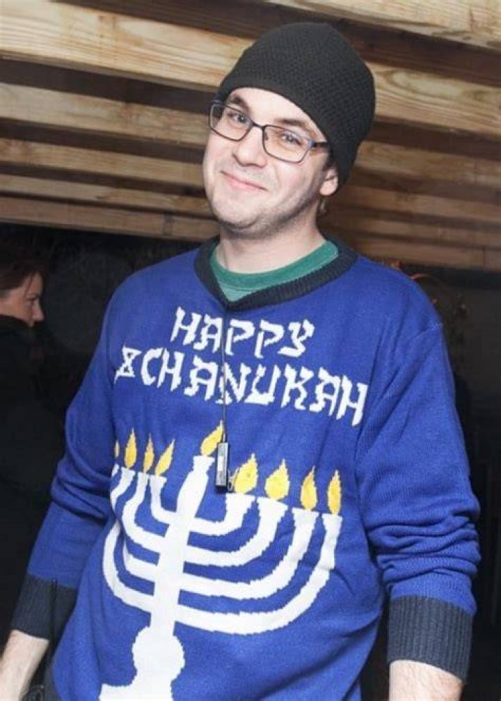 Alan Aisenberg as seen while smiling in a picture in December 2014