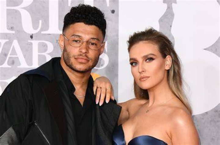 Alex Chamberlain and Perrie Edwards as seen in 2017