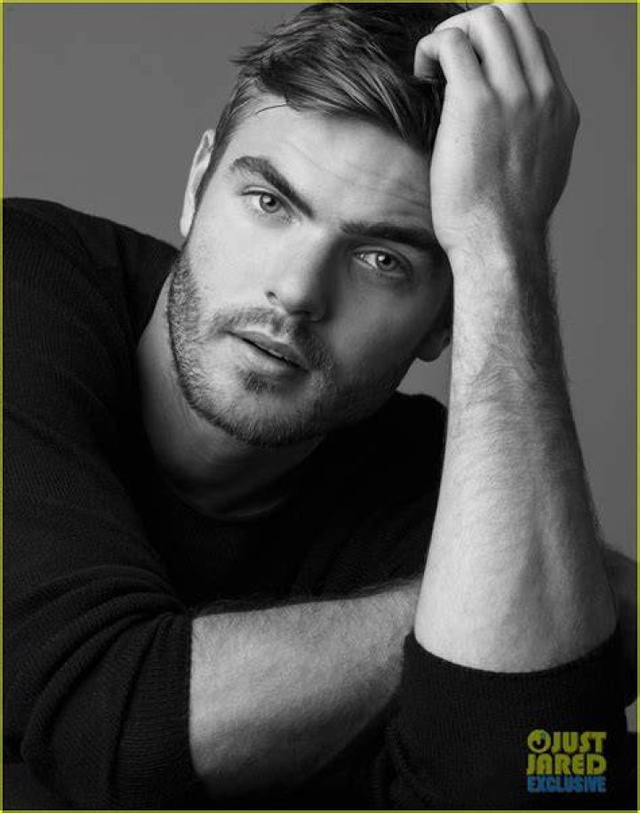 Alex Roe enjoying his time with a seal in July 2017