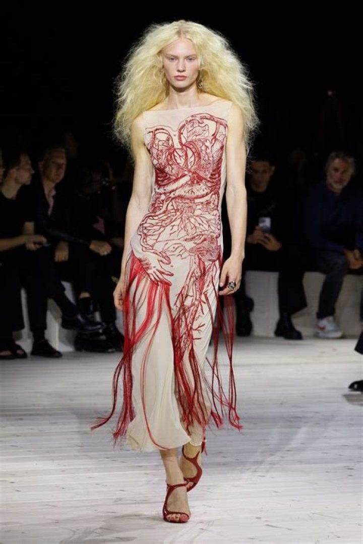 Alexander McQueen prepararing for a fashion show