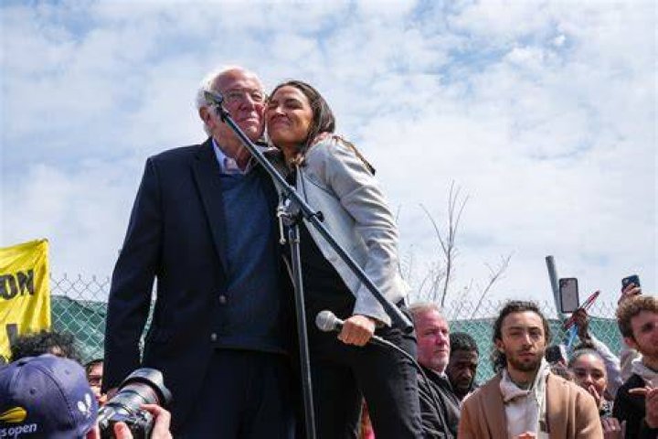 Alexandria Ocasio-Cortez and Sen. Bernie Sanders at a rally in Council Bluffs, Iowa in November 2019