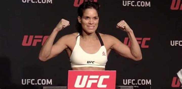 Amanda Nunes on the scale during her weigh-in for UFC 200 in July 2016