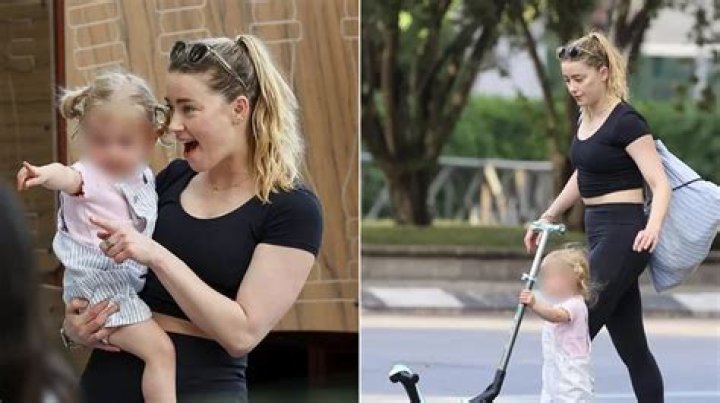 Amber Heard while enjoying her food in March 2022 click