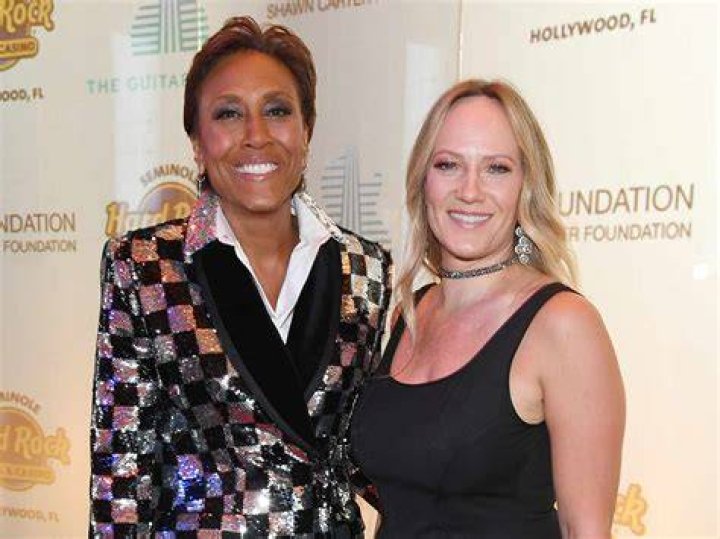 Amber Laign and Robin Roberts celebrating 12 years together on a weekend getaway in August 2017