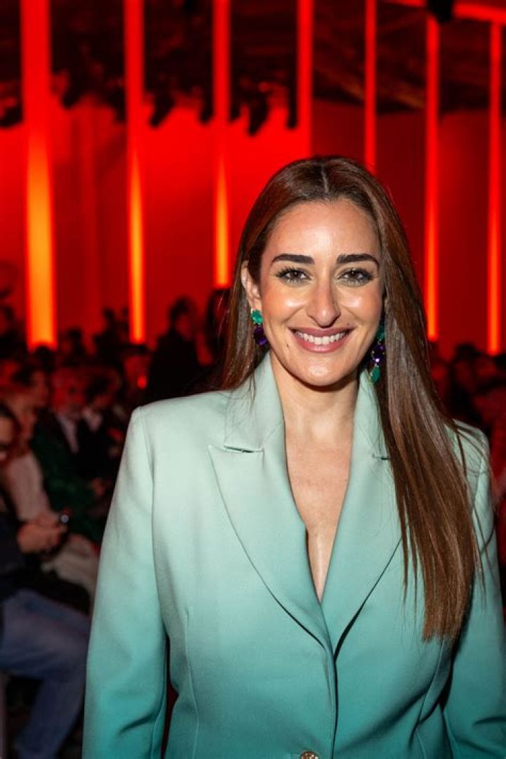Amina Khalil smiling in a picture alongside Russell Peters at Zed Park in Egypt in December 2021