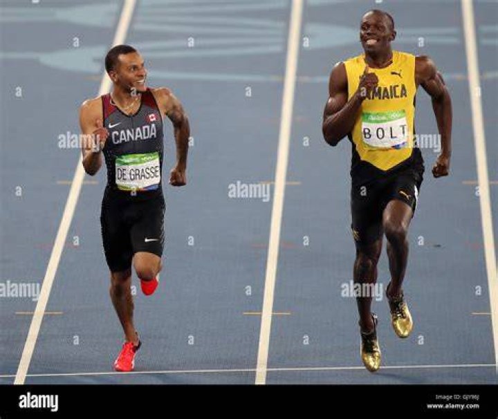 Andre De Grasse (Left) and Usain Bolt as seen after running the 100 m final at the 2016 Olympics