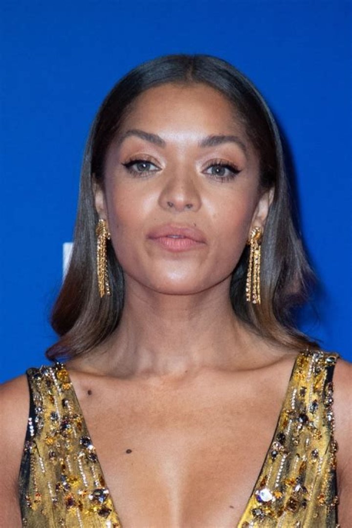 Antonia Thomas in a picture taken with a monkey in April 2019