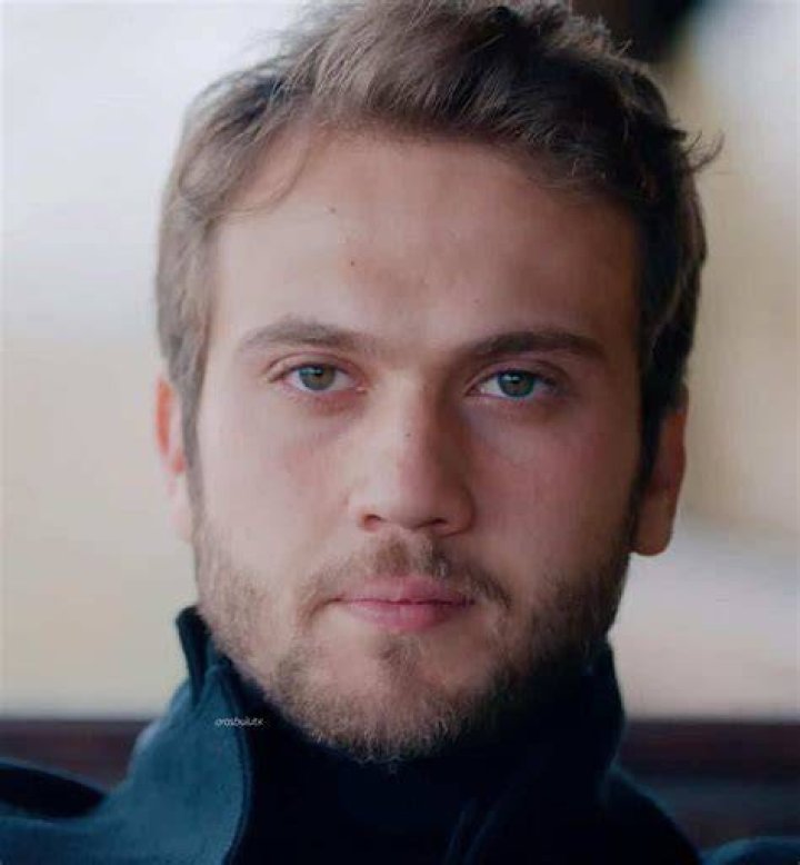 Aras Bulut İynemli as seen while smiling for the camera in December 2019
