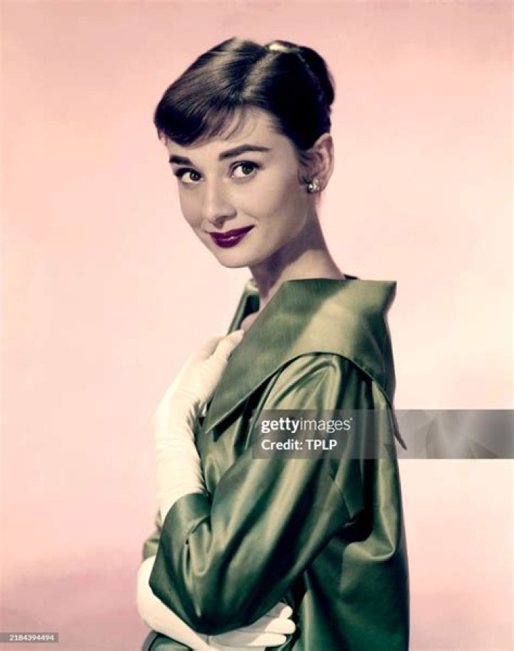 Audrey Hepburn poses for a modeling photoshoot