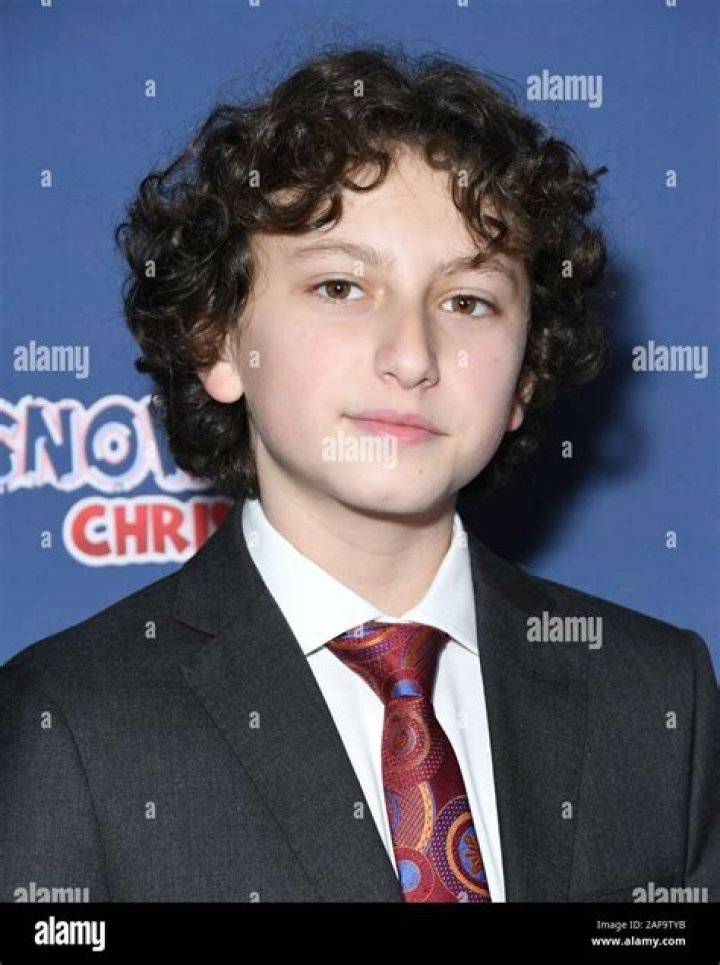August Maturo in May 2019 sharing his photo with the cat with the cutest little grumpy face