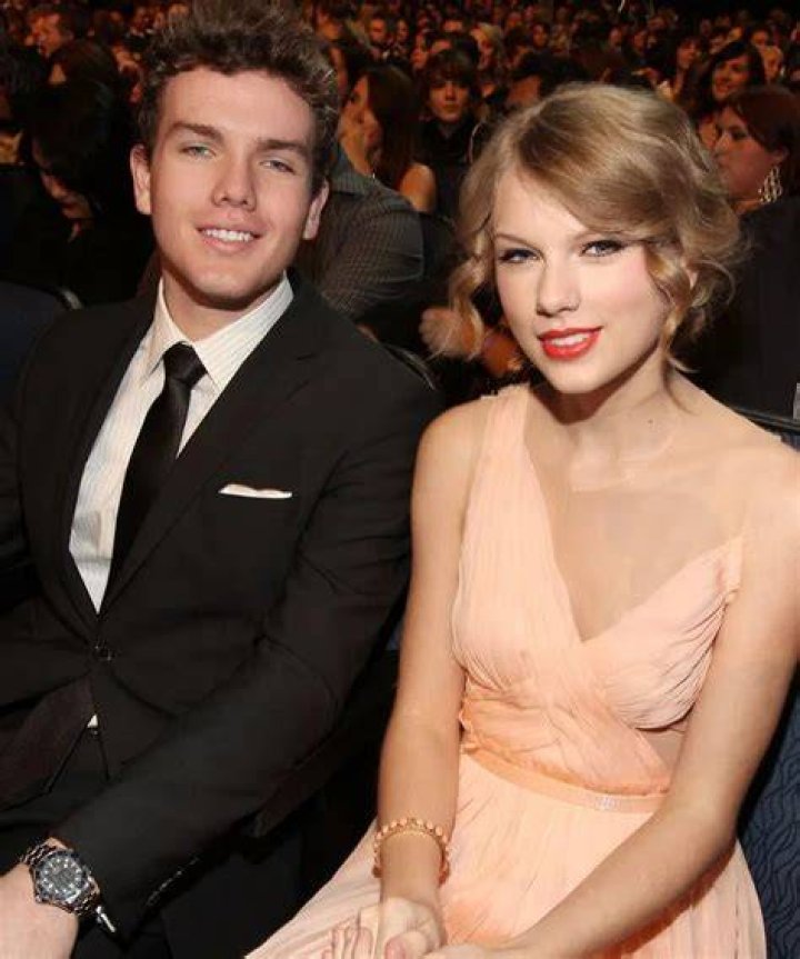 Austin Swift (Left) with his father as seen in January 2014