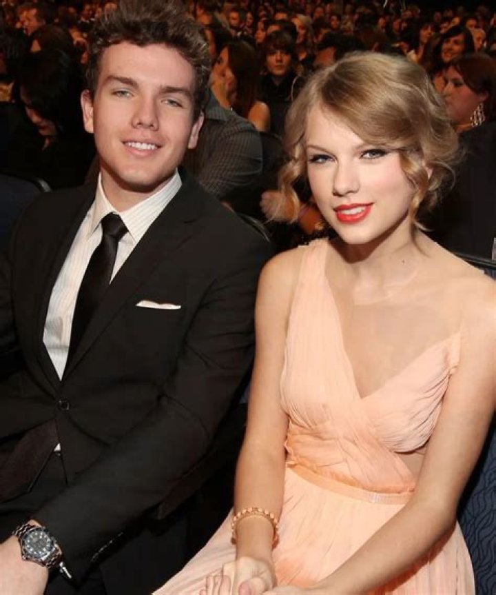Austin Swift with his cat as seen in August 2014