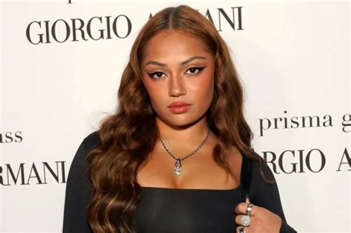 Avani Gregg wearing a black dress for a photoshoot in July 2023