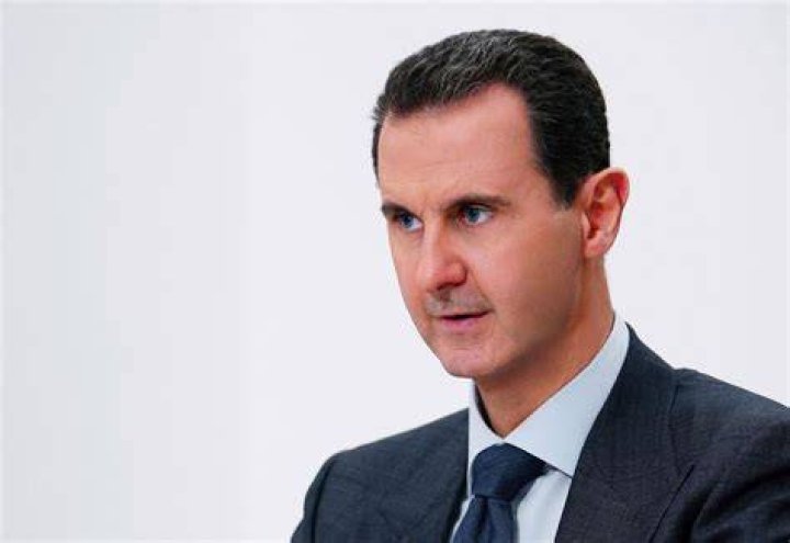 Bashar al-Assad (Left) as seen while meeting President Vladimir Putin of Russia in Moscow, Russia to discuss the military operations in Syria in October 2015
