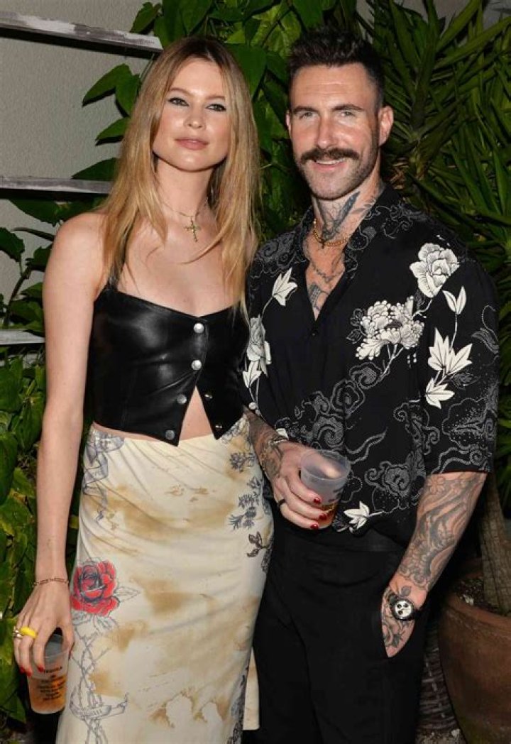 Behati Prinsloo with Adam Levine