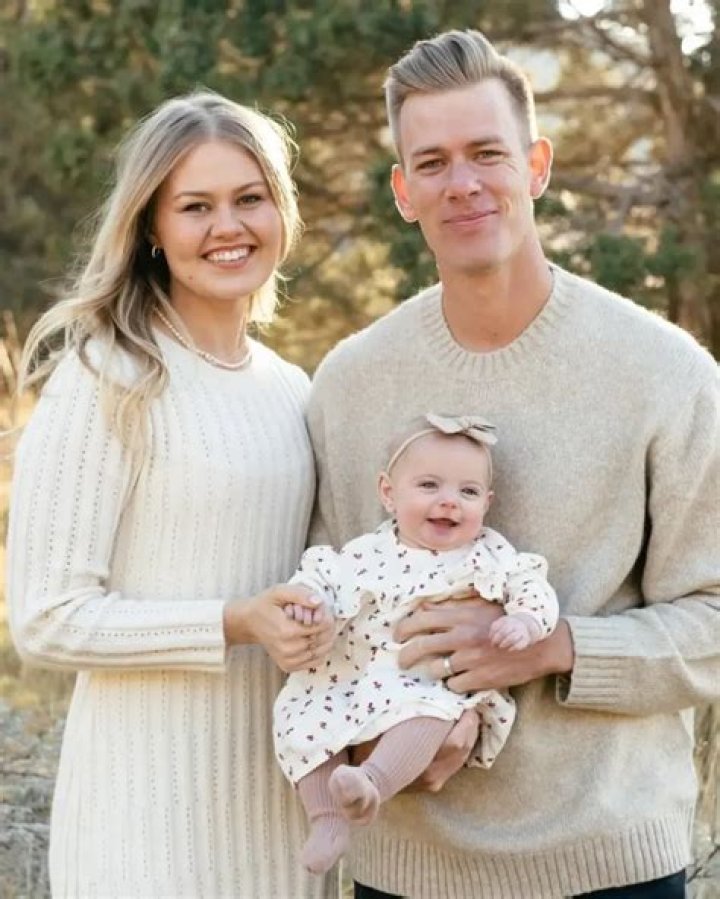 Bella Weems-Lambert and her husband Dallin Lambert and their dog Banks Lambert in November 2021, in Gilbert, Arizona