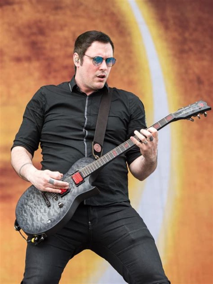 Benjamin Burnley smiling in a picture with his son in January 2021