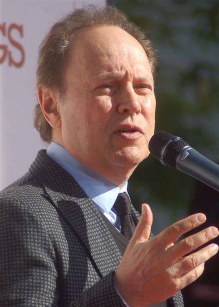 Billy Crystal while speaking at a ceremony for Robert DeNiro to have his hands and shoe prints placed in cement in front of TCL Chinese Theatre in February 2013