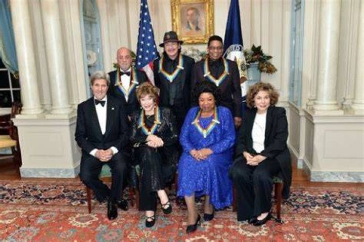 Billy posing with fellow 2013 Kennedy Center honorees Carlos Santana, Herbie Hancock, Shirley MacLaine, and Martina Arroyo in Washington D.C.