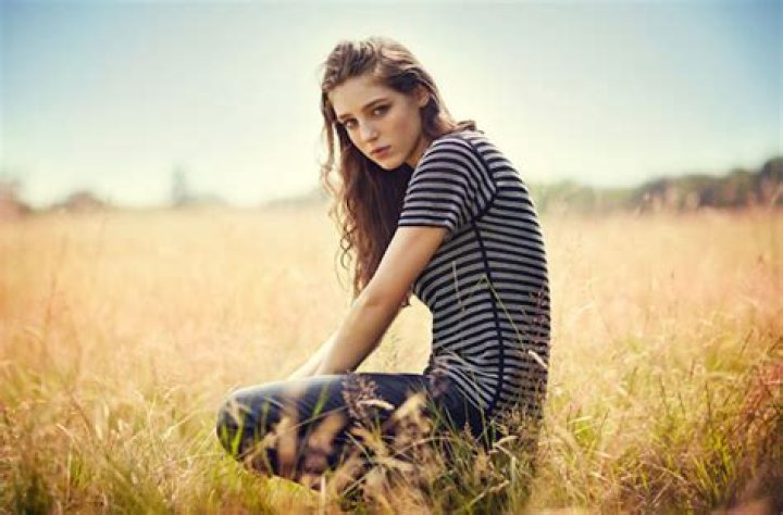 Birdy posing during a photoshoot for Creem Magazine