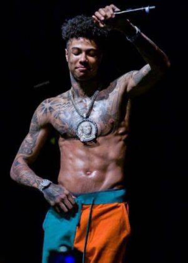 Blueface as seen shirtless in a picture taken during one of his performances in April 2019