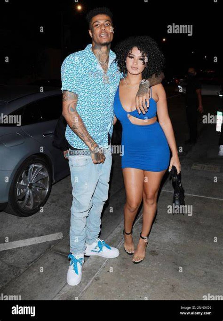 Blueface (Left) as seen while posing for a picture with rapper G-Eazy in February 2019