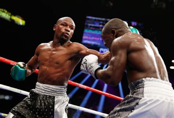Boxer Floyd Mayweather, Jr. and Doralie Medina at the BET Awards 2014 in Nokia Theatre L.A Live, Los Angeles, California on June 29, 2014