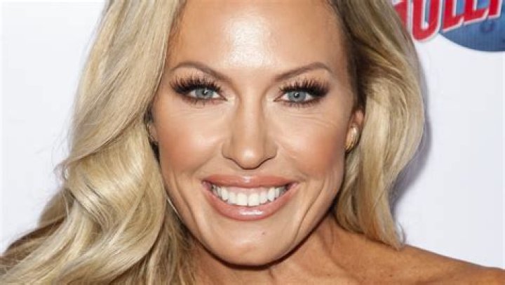 Braunwyn Windham-Burke smiling in a picture alongside her husband Sean Burke in New York City, New York in October 2020