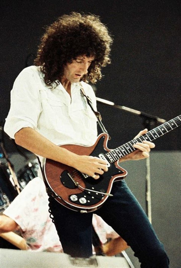 Brian May posing with the 51 Degrees production team outside Sarm Studios in June 2014