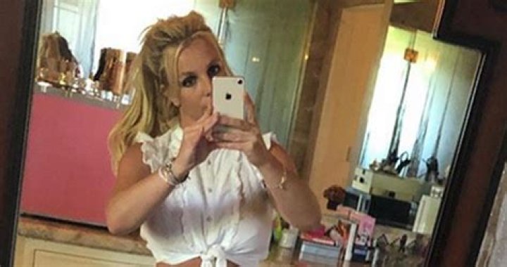 Britney Spears mirror selfie wearing red dress in 2018