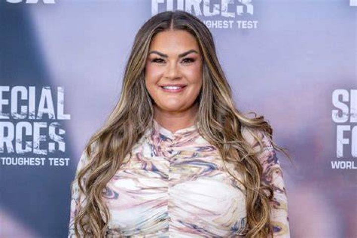 Brittany Cartwright smiling in a picture alongside Jax Taylor in Los Angeles, California in November 2019