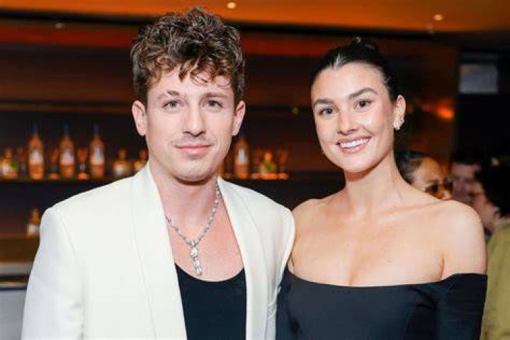 Brooke Sansone and Charlie Puth announcing their engagement in September 2023, at Lucali's