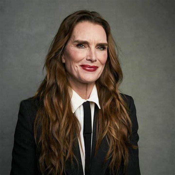 Brooke Shields reveals her flawless beach body as she takes a late afternoon stroll in the Mexican sea