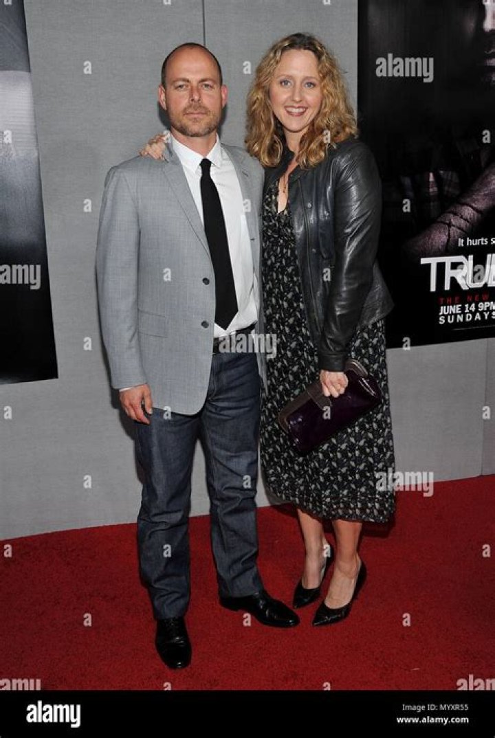 Brooke Smith and her husband Steve Lubensky as seen in a picture with their dog on the beach in June 2020