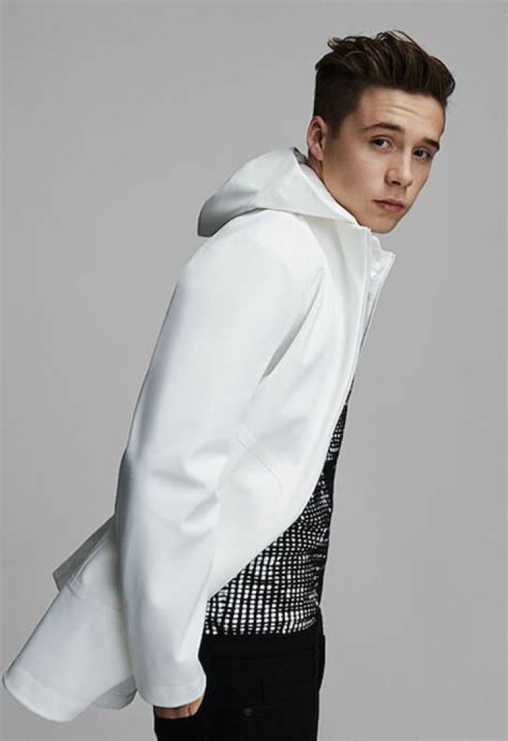 Brooklyn Beckham posing for Roller Coaster Magazine cover.