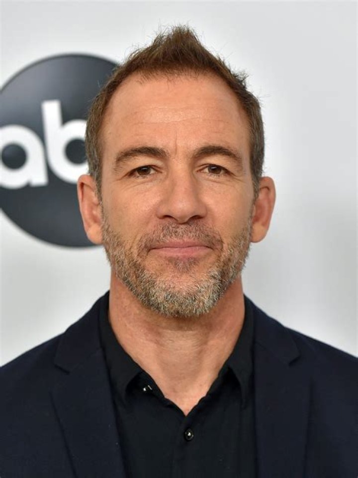 Bryan Callen in a picture with his son