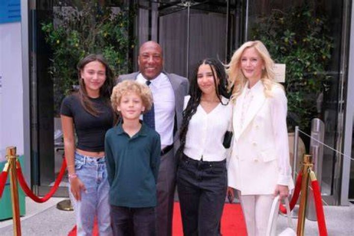 Byron Allen, posing with his wife and children, in October 2022
