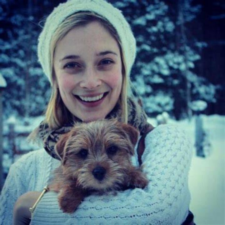 Caitlin FitzGerald with her dog as seen in February 2014
