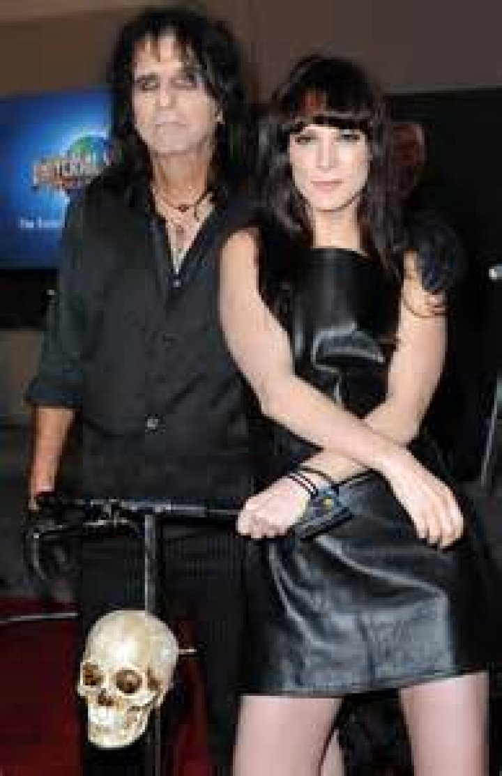 Calico Cooper posing with Paul McCartney in 2015