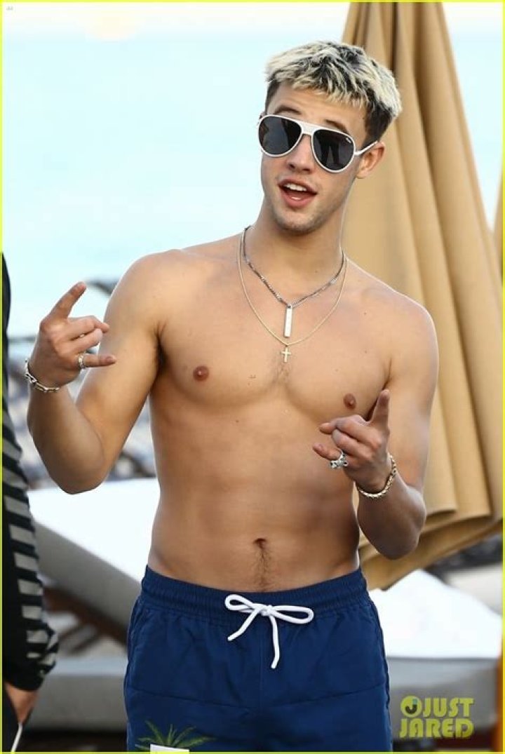 Cameron Dallas showing his shirtless body