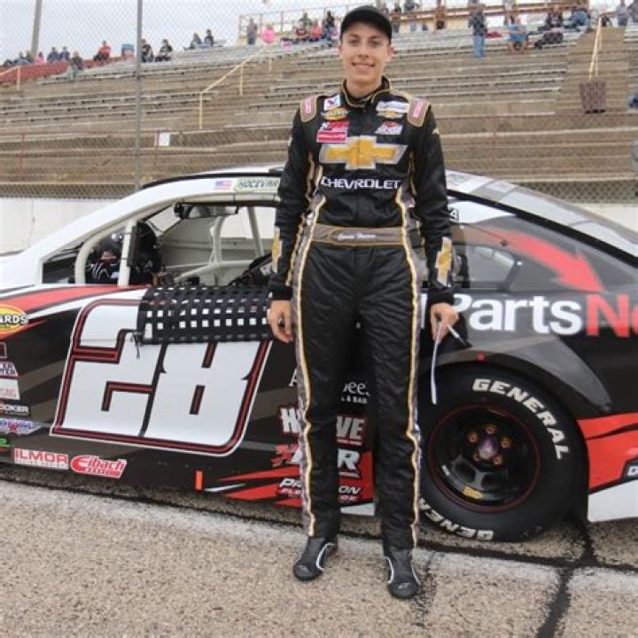 Carson Hocevar beside his #28 Chevrolet SS ARCA car at Madison International Speedway on June 14, 2019