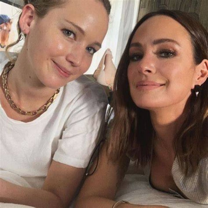 Catt Sadler posing with actress Jennifer Lawrence during her Naked podcast interview