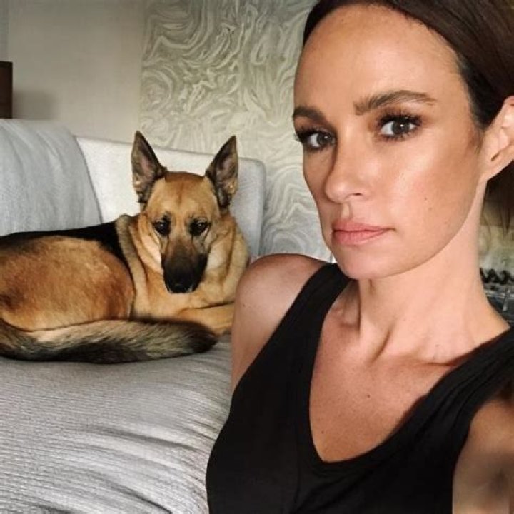 Catt Sadler with her pet dog Scarlett in October 2017