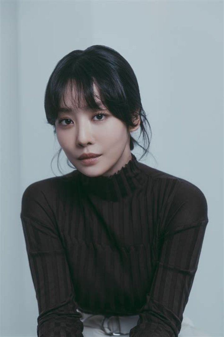 Cha Joo-young as seen while smiling for the camera at the press conference for 'The Real Has Come!' in March 2023